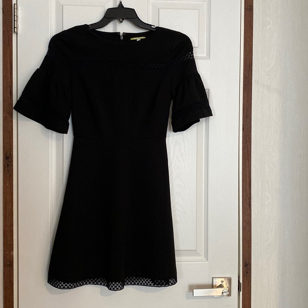 Black Short puff sleeve dress.